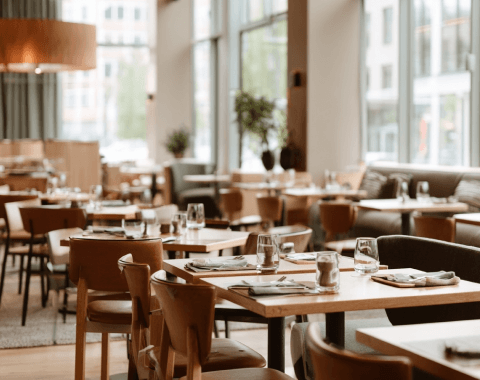 scandinavian-hotel-restaurant-interior-arranged-tables-chairs