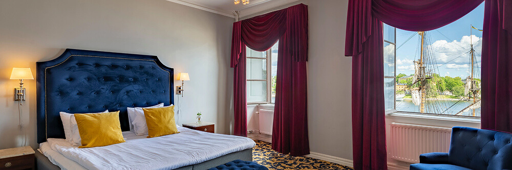 Vi Invest - Rum i Hotel Gamla stan med utsikt över vattnet